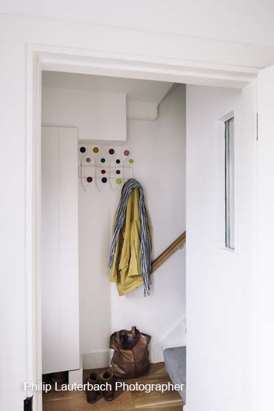 Hallway storage coat hooks door frame