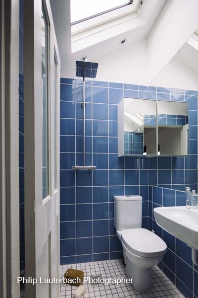 Ensuit bathroom tiling skylight wetroom shower