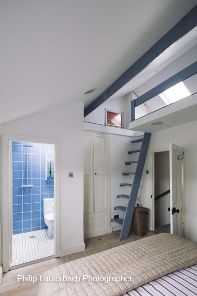 bedroom lift skylight ensuit bathroom ladder painted timber beams storage timber flooring