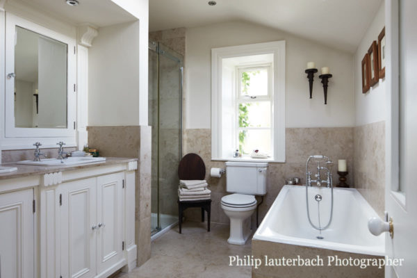 bathroom sink faucet wall mirror tiling shower toilet bathtub