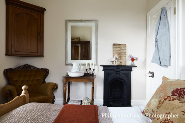 Bedroom mirror fireplace side table chair timber door