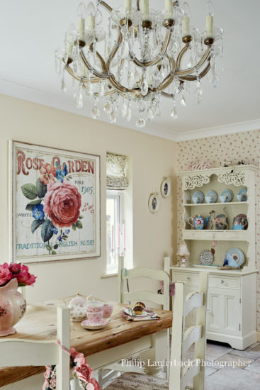 Kitchen dining area chandelier dresser storage wallpaper wall art table chaira floor tiling