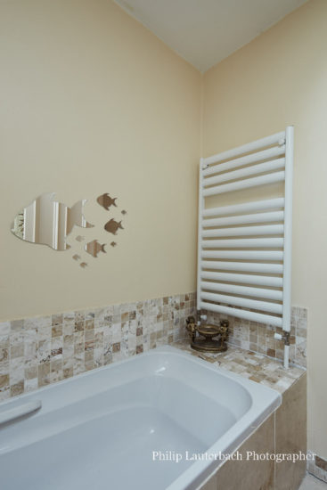 Bathroom bath heated towel rail