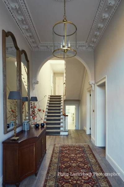 Hallway, architrave molding,lighting,stairs,carpet,mirror,